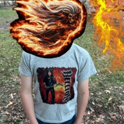 Hellion Recruit in the Wild. Identity hidden. Allegiance obvious. Boy standing outdoors, showcasing a Hellion shirt.