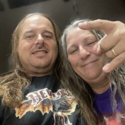 Documented sighting: James & Theresa, roaming the wild in full Hellion gear. Confidence level: 100%. Chaos level: rising. James and Theresa wearing Hellion merch, posing together.