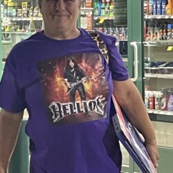 Teresa, OG Hellion supporter, spotted in the wild coming out of an auto parts store, repping the Terry Blazer Hellion tee. Teresa wearing a Terry Blazer Hellion t-shirt outside a store.