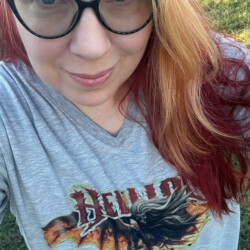 Peaceful stance, rebellious heart. Classic Hellion. Lisa went for fresh air and came back with album-cover energy. Holisticfox wearing Hellion merch outside.